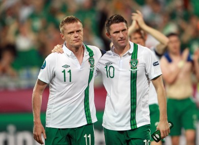 Down and out: Keane and Damien Duff, left, after Ireland's Euro 2012 defeat to Italy in the Municipal Stadium.