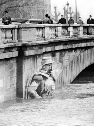The figure of a Zouave half-submerged in January 1955 when the River Seine rose in Paris to dangerous levels/