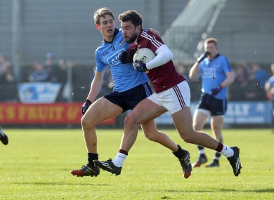 Michael Fitzsimmons of Dublin with Paul Sharry of Westmeath.