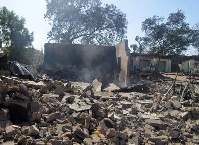 File: A burned out building is seen after an attack by Boko Haram in Bama, Nigeria.
