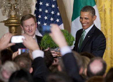 Taoiseach Enda Kenny and US President Barack Obama shake the shamrock at the White House.