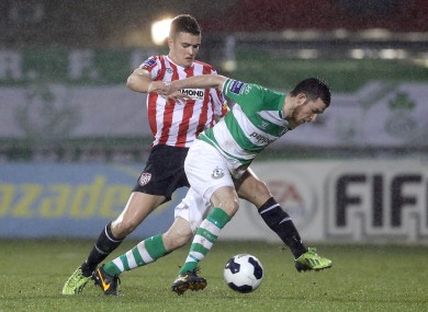 Shamrock Rovers' Ryan Brennan with Michael Duffy of Derry City.