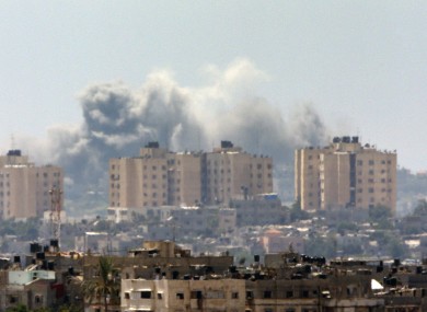 Smoke rises following an Israeli strike on Gaza, seen from the Israel-Gaza border.