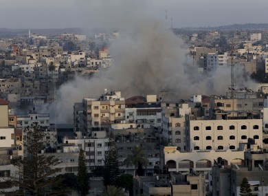 Smoke rises following an Israeli strike on Gaza Strip, Friday, July 11, 2014.