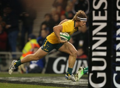 Nick Cummins scores a try against Ireland in November 2013.