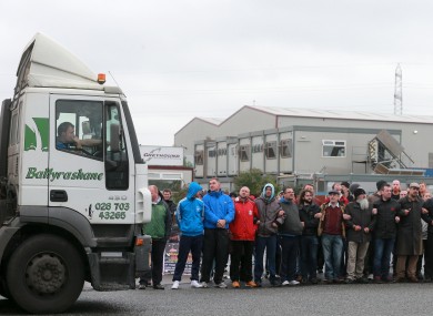 A truck is blocked by supporters of the striking workers at Greyhound Recycling plant.
