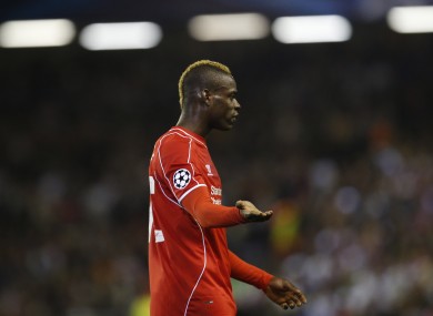 Liverpool's Mario Balotelli gestures during the Champions League group B soccer match between Liverpool and Real Madrid.