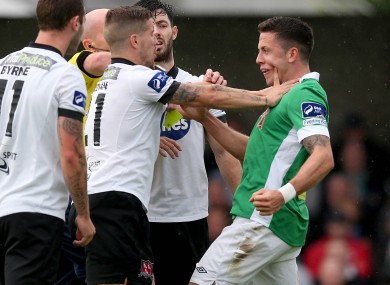 Darren Meenan of Dundalk and Cork's Billy Dennehey when the teams met earlier in the season.