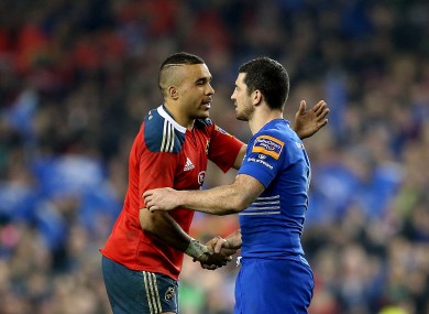 Kearney shakes hands with Simon Zebo at the Aviva Stadium last season.