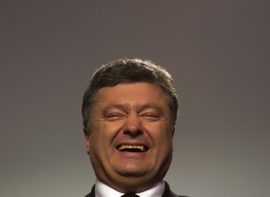 Petro Poroshenko, looking particularly happy during a press conference yesterday.