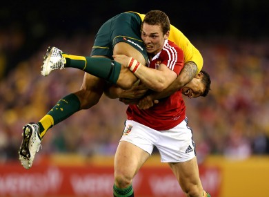 George North making light work of an Israel Folau tackle in the second Lions Test last year.