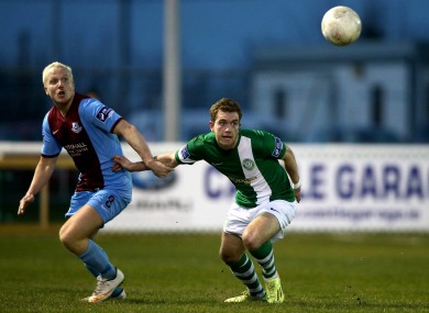 Sean Thornton fights for the ball in the season opener against Bray.