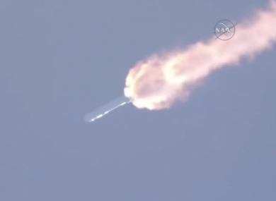 The SpaceX Falcon 9 rocket begins to break up after launch