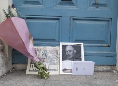 Flowers in the doorway where homeless man Jonathan Corrie died in December of last year.