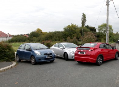 Residents' vehicles on Rockville Drive block the entrance into the site earmarked for survivors of the Carrickmines fire