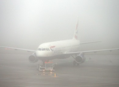 Fog on the runway at Heathrow airport.