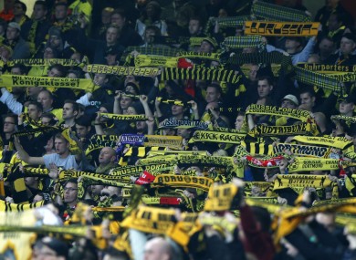 Dortmund fans are unhappy at being charged high prices for tickets.