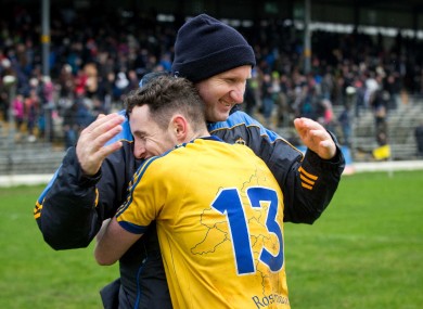 Roscommon boss Fergal O'Donnell celebrates victory with attacker Ciaran Murtagh.