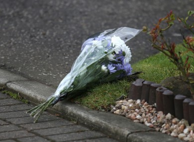 Flowers outside a house in Dalgety Bay in Fife, where the boys died.