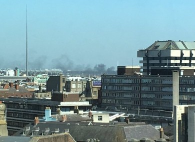 Black smoke rises across the northside of Dublin city.