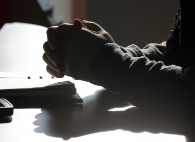 Defector Lee Soung Hee, 42, who worked at a North Korean-run restaurant in China, puts her hands together during an interview in Seoul, South Korea.