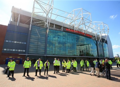Security cordon around Old Trafford after the game is abandoned during the Barclays Premier League match at Old Trafford.