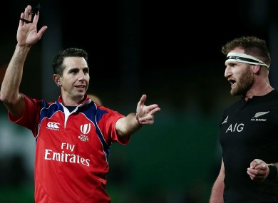 Referee Craig Joubert and All Blacks captain Kieran Read.