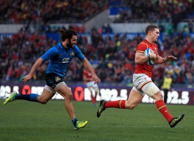 George North runs in to score Wales' third try.