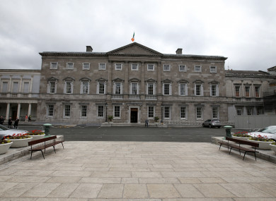 The man was taken from Leinster House by ambulance.