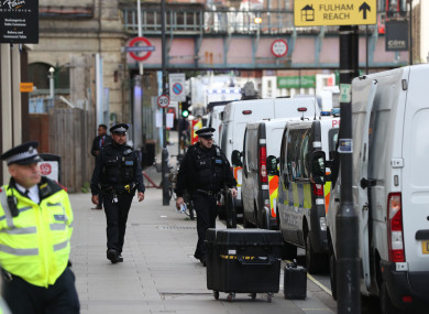Police activity outside Parsons Green station in west London yesterday.