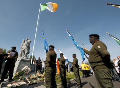 File: The 32 County Sovereignty Movement Easter Commemoration in 2011 sees a member of the Real IRA read a statement.