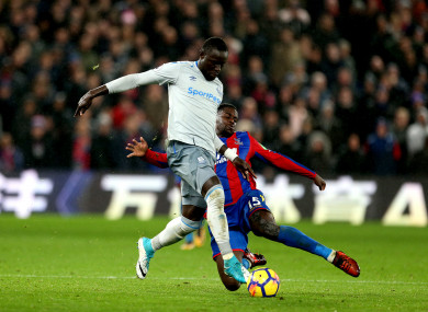 Niasse in action against Jeffrey Schlupp of Palace.