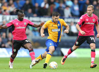 Hoban (centre) most recently played for Mansfield Town.