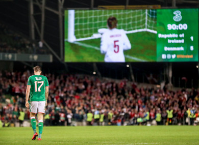 Stephen Ward trudges off the pitch with the scoreboard showing 5-1.