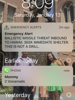 A smartphone screen show a false incoming ballistic missile emergency alert sent from the Hawaii Emergency Management System last week.
