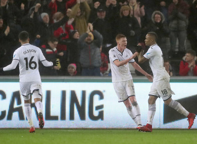 Swansea goalscorer Jordan Ayew (right) with Sam Clucas (centre) and Martin Olsson.
