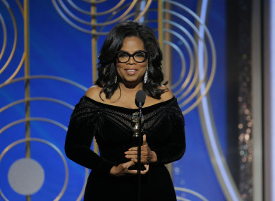 Oprah Winfrey accepts the Cecil B. Demille Award during the 75th Golden Globe Awards at the Beverly Hilton last night.