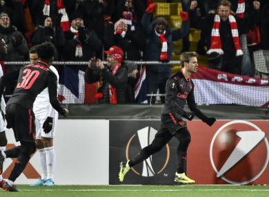 Arsenal's Nacho Monreal, right, celebrates after scoring his side's first goal.
