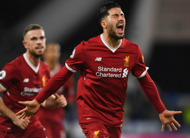 Emre Can celebrates a Liverpool goal.