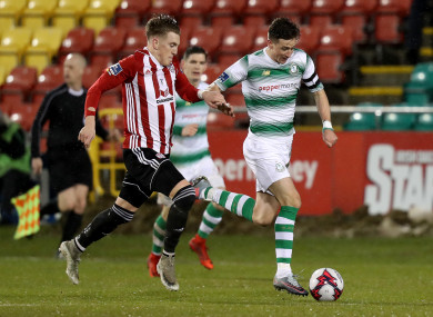 Derry City's Ronan Curtis with Ronan Finn of Shamrock Rovers.