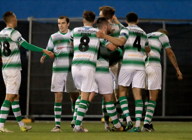 The Rovers players celebrate their goal.