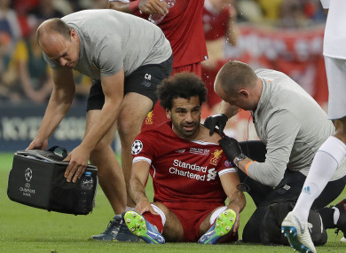 Liverpool's Mohamed Salah gets medical treatment during the Champions League Final.