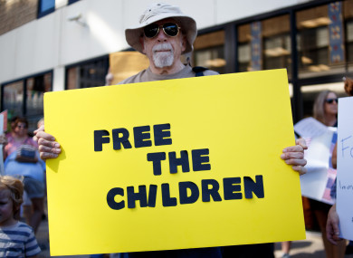 Protesters participate in a Families Belong Together rally, speaking out against the Trump's policies separating immigrant families