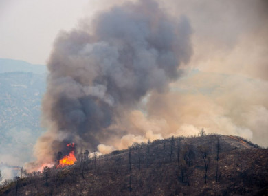 A hot spot flares along the High Valley Road during the Ranch Fire yesterday.