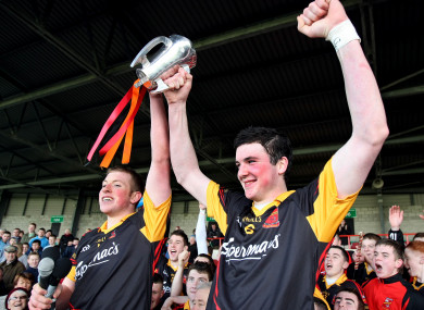 Shane Dowling and Declan Hannon lift the Dr Harty Cup in 2011.