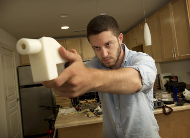 Cody Wilson shows the first completely 3D-printed handgun called The Liberator.