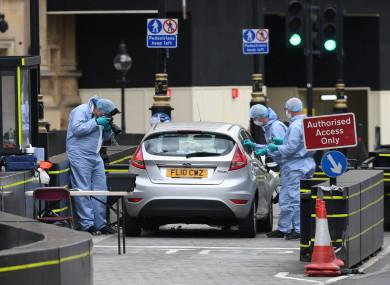 Forensic officers at the scene of the crash