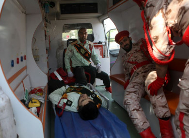 Wounded military personnel in an ambulance after today's shooting.