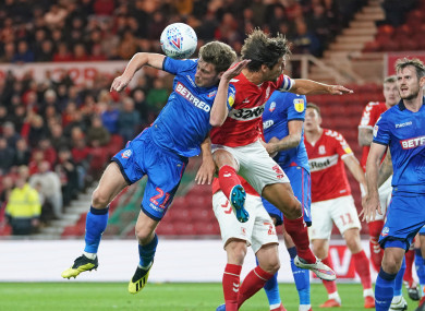Middlesbrough's George Friend (right) and Bolton Wanderers' Joe Williams during tonight's game at the Riverside Stadium.