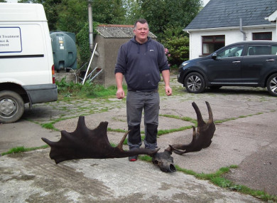 Raymond McElroy pictured with the skull and antlers.